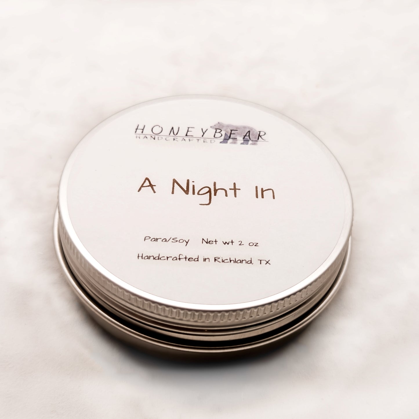 image of 2 oz travel or sample size candle labeled A Night in on a white background